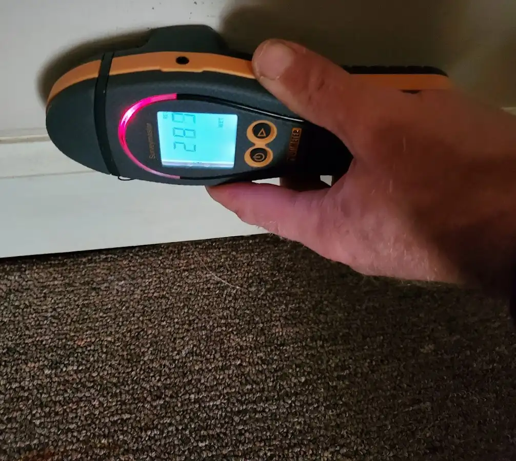 Moisture detection at baseboard during Burst Pipe Cleanup in Beacon Falls